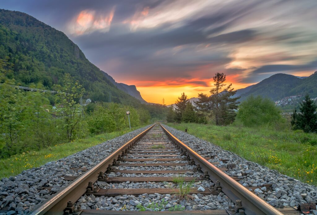 An image of railroad tracks in the setting sun an advanced listener might imagine upon hearing the lyrics of Glen Campbell's "Gentle On My Mind".